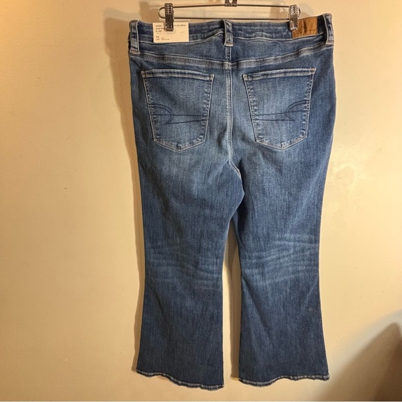 AMERICAN EAGLE Sz 16S Super High Rise Flare Distressed Hem Mid-Wash Jeans NEW - Picture 7 of 13